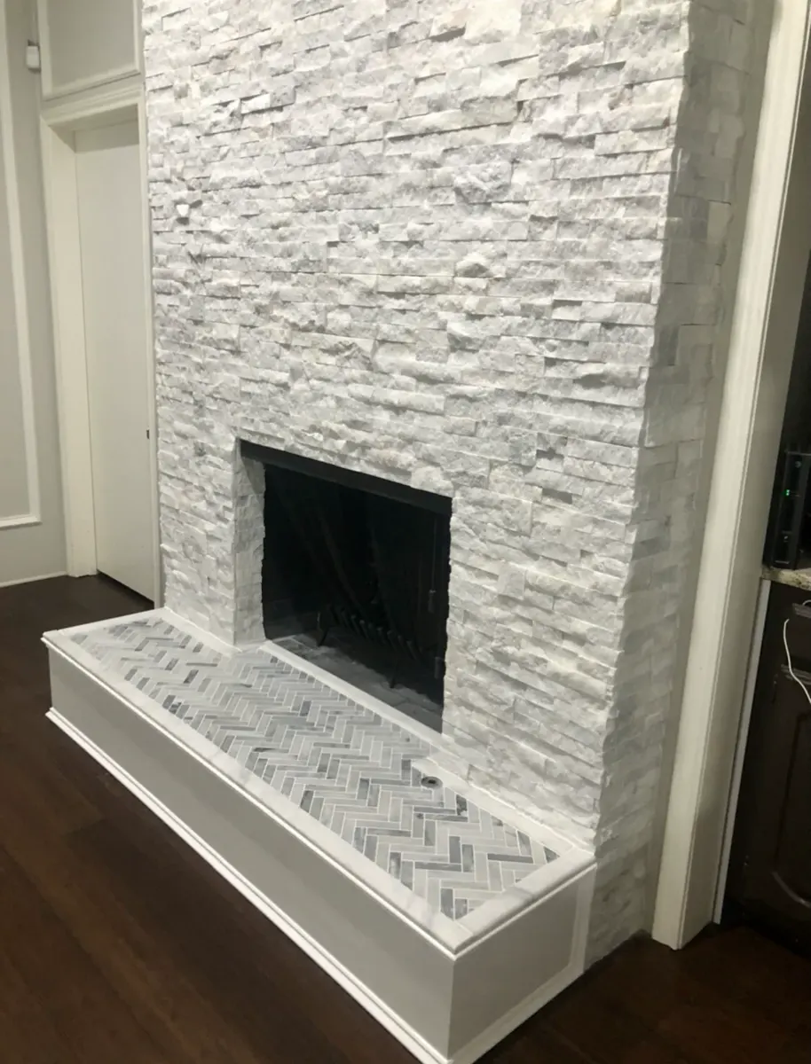 Stone Fireplace Remodel completed by Hall of Fame Construction